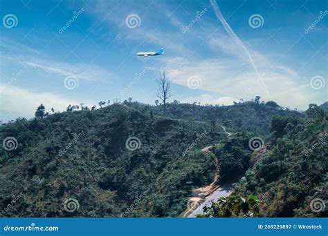 Plane Flying Over Beautiful Mountains, Trees, Hills on a Sunny Day ...