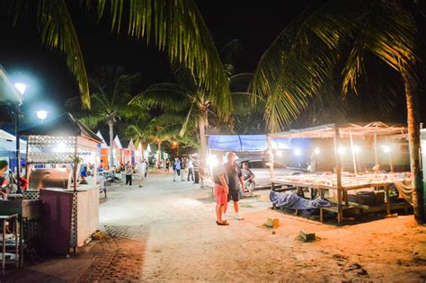 Spending An Exciting Evening At Oistins Fish Fry In Barbados - Hand ...