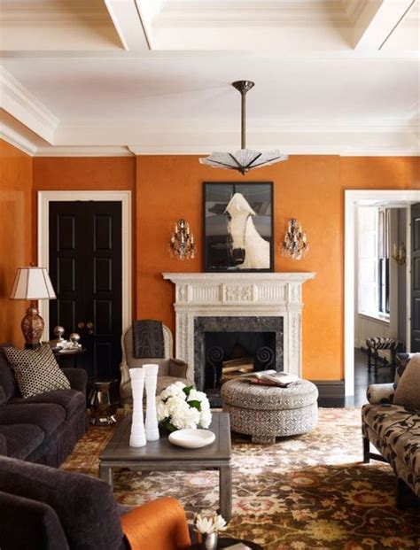 Love the orange walls and white mantel! Shop for fabulous home decor at ...