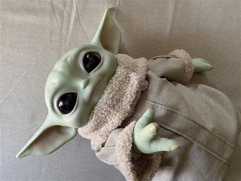 This official Baby Yoda 11-inch plush toy is adorable