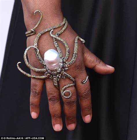 Whoopi Goldberg reveals her shoulder tattoo in black frock on Oscars ...