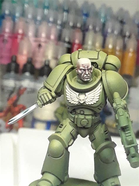 I'm working on my Space Marine faces. C+C would be helpful. : Warhammer