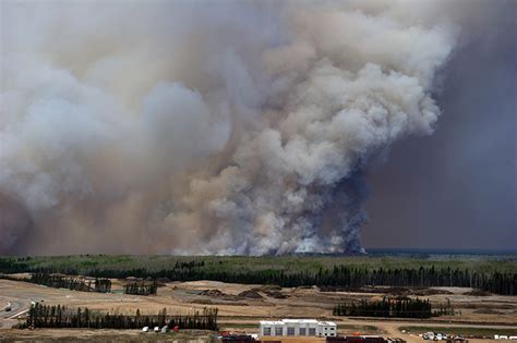 IN PHOTOS: The Fort McMurray fire that displaced 80,000 people ...