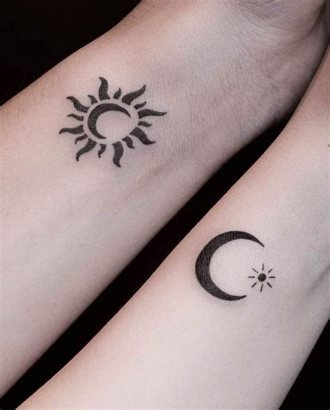 Moon And Sun Kissing Tattoos