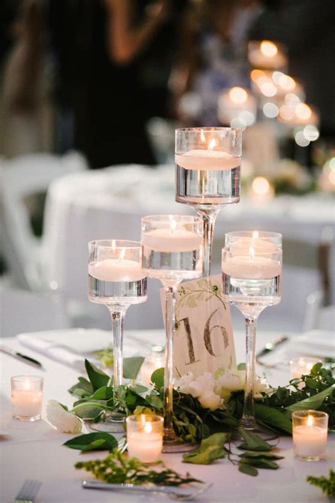 Elegant floating candle centerpieces | Candle wedding centerpieces ...