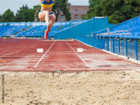 execution of the triple jump Stock Photo | Adobe Stock