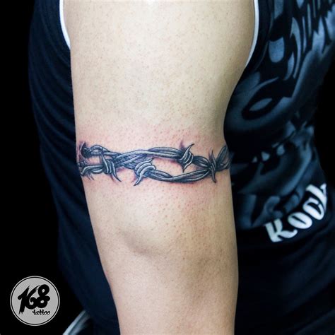 Barbed wire tattoo, some old style thing | Barbed wire tattoos, Wrist ...