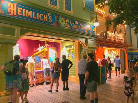 Pixar Pier Boardwalk games - Heimlich's Candy Corn Toss | #PixarFest is ...