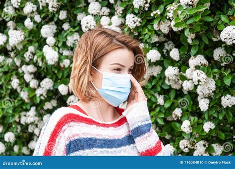 Allergy. Woman Wearing Protect Mask from Pollen Allergy Stock Photo ...