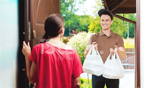 Delivery Man Delivering Chinese Take Away Food Stock Photos ...