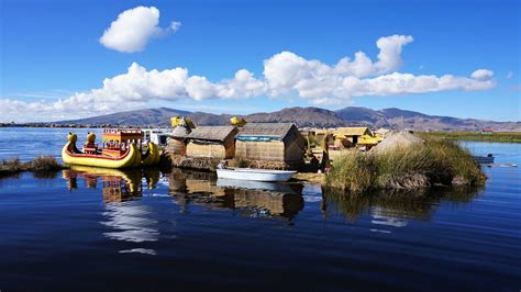 A traditional floating island on Lake Titicaca - Our Big Fat Travel ...