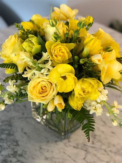 Yellow floral arrangement by Stem Floral Design | Yellow flower ...