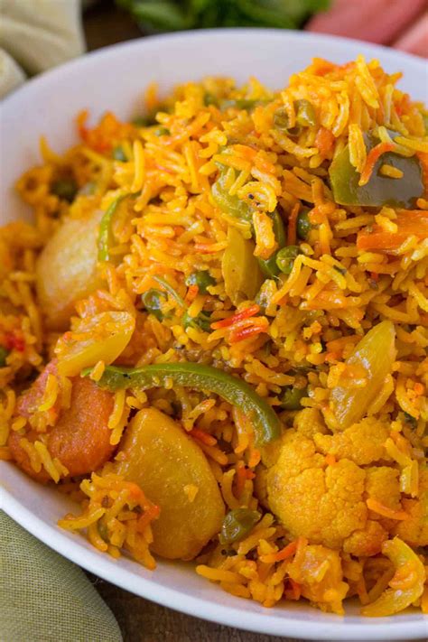 Vegetable Biryani is a bold and flavorful Indian rice dish with bell ...