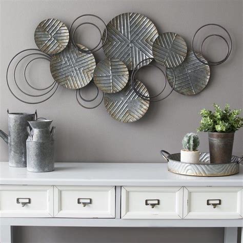 Décoration métal moderne | Metal wall decor, Plates on wall, Plate wall ...