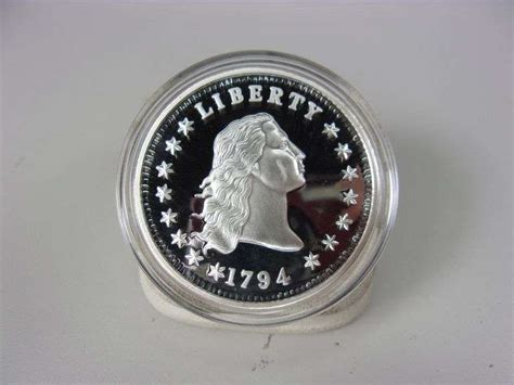 1794 FLOWING HAIR SILVER DOLLAR (REPLICA) - Bentley & Associates, LLC