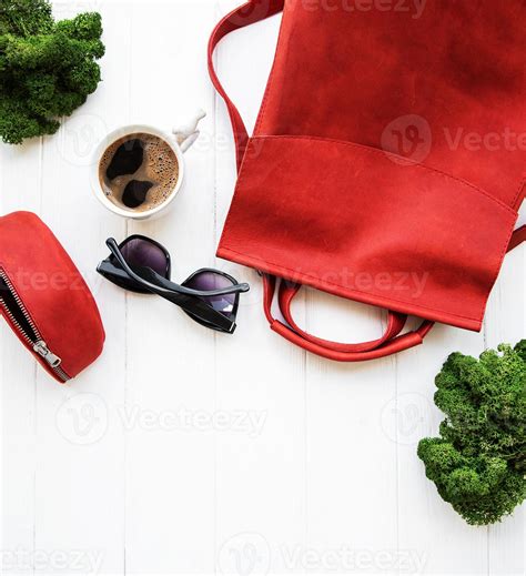 Red leather backpack with accessories 5697111 Stock Photo at Vecteezy