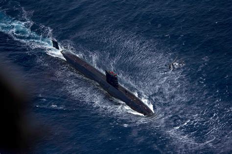 Royal Navy Trafalgar-class submarine HMS Trenchant (S91) and Royal Navy ...