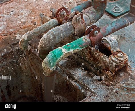 Decaying copper piping Stock Photo - Alamy