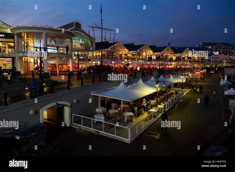 Victoria Wharf Shopping Mall, at V&A Waterfront at dusk, Cape Town ...