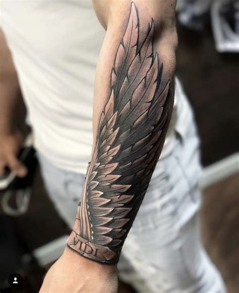 Update more than 66 tattoo wings on arm super hot - thtantai2