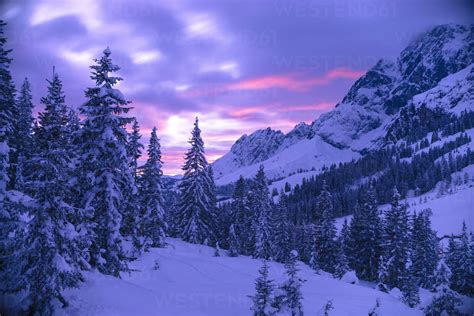 Austria, Hochkoenig, Muehlbach, winter landscape at sunset stock photo