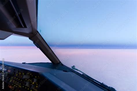 Beautiful twilight sunset and skyline at high altitude from airplane ...