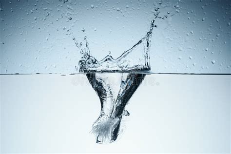 Ice Cube in Water with Splash Stock Image - Image of bubbles, agua ...