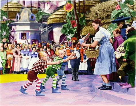 Dorothy being welcomed by the Lolipop Guild of Munchkin Land | Wizard ...