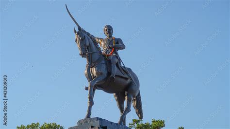 Statue of Chhatrapati Shivaji Maharaj on horseback riding a horse with ...