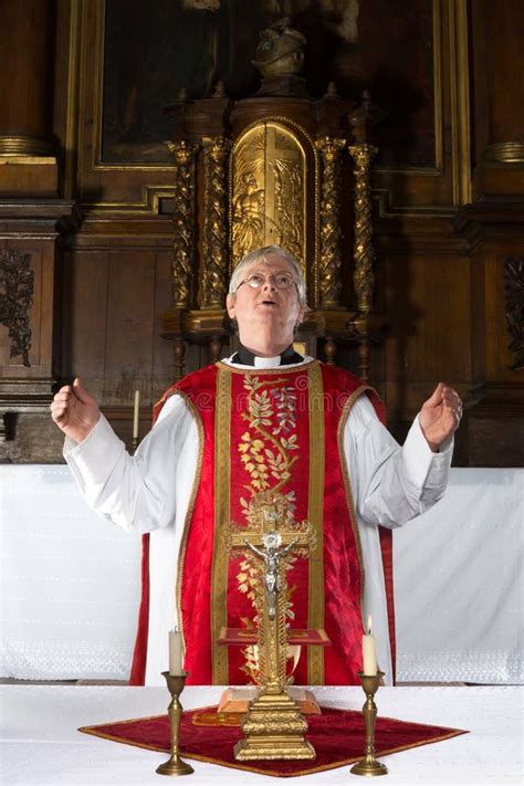 Priest praying during mass stock photo. Image of chalice - 28892806