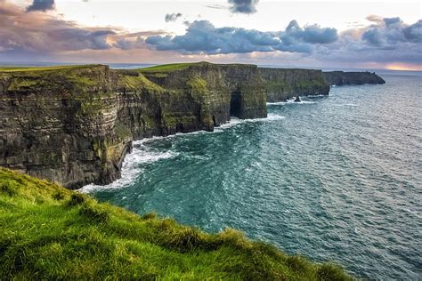 Sunset at the Cliffs of Moher Photograph by Pierre Leclerc Photography ...