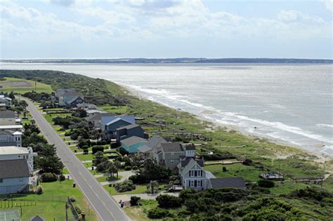 Lighthouse View In Caswell Beach Nc Stock Photo - Download Image Now ...