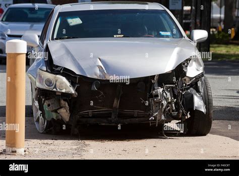 Car with front end collision damage - USA Stock Photo - Alamy