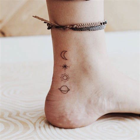 Small planets tattoo by kalula - Tattoogrid.net