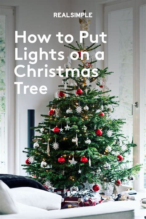 How to Hang Christmas Tree Lights Like a Pro | Hanging christmas tree ...