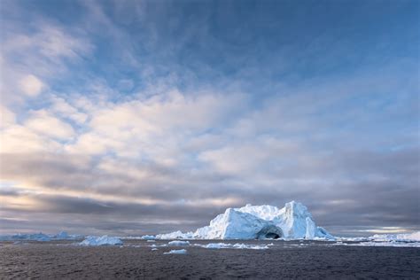 Temple of Ice, icebergs at sunset in the Ilulissat Icefjord - NiO ...