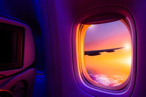 View of 'Northern Lights' From Airplane Window Seat Is Just ...