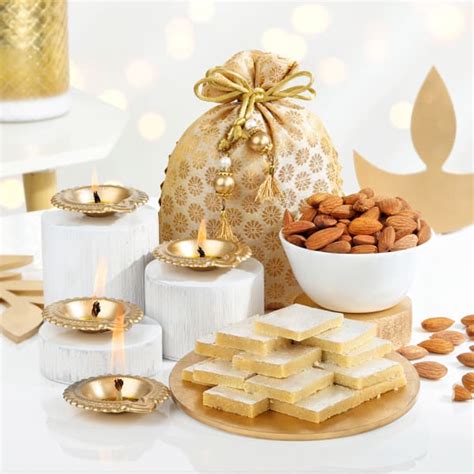 Buy/Send Kaju Katli with Diwali Diyas & Almonds Online | IGP | HD1107058