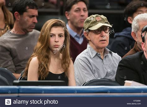 Manzie Tio and Woody Allen. Woody Allen attends a New York Knicks Stock ...