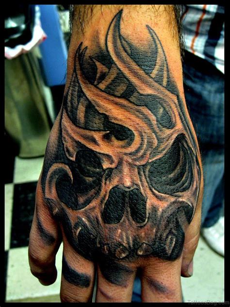 Discover more than 81 skull hand tattoo drawing latest - in.coedo.com.vn