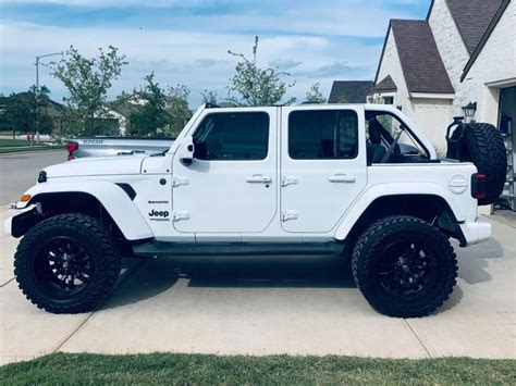 Unleash Your Style with a White Jeep Black Wheels: Click Here to Upgrade!