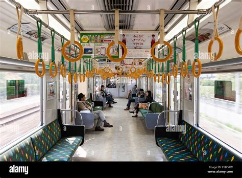 Japanese railways railcar unit, train. Interior of commuter railway ...