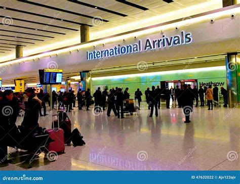 International Arrivals at Heathrow Editorial Photography - Image of ...