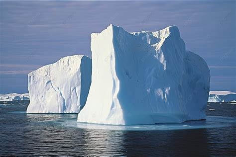 Two Large Icebergs Floating Over Water In The Ocean Background, Cloud ...