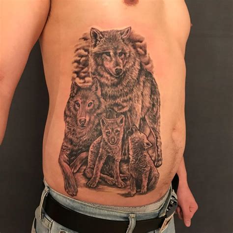 Wolfpack tattoo on ribs/stomach by Toos from Tattooism in Seoul, Korea ...