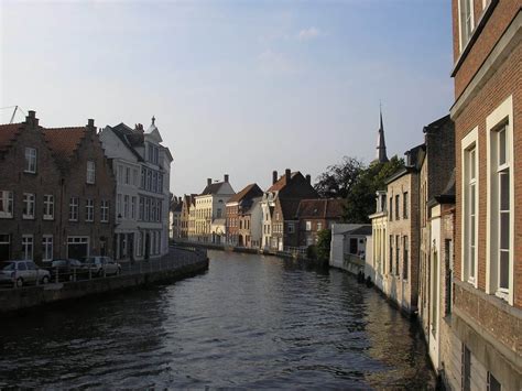 Photo Essay: Beautiful Canals in Bruges, Belgium - Adventurous Kate