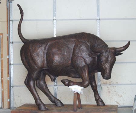 Bull statue bronze monument