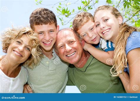 Happy smiling family stock photo. Image of parents, outside - 16380152