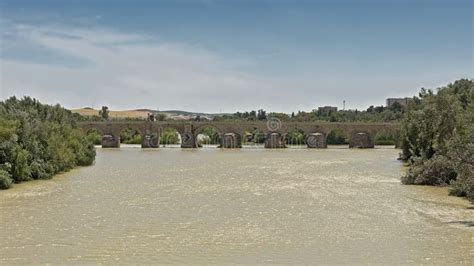 Roman Bridge Over Guadalquivir River in Cordoba Stock Image - Image of ...