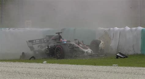 Romain Grosjean Crashes After Drain Cover Comes Loose in Malaysia ...